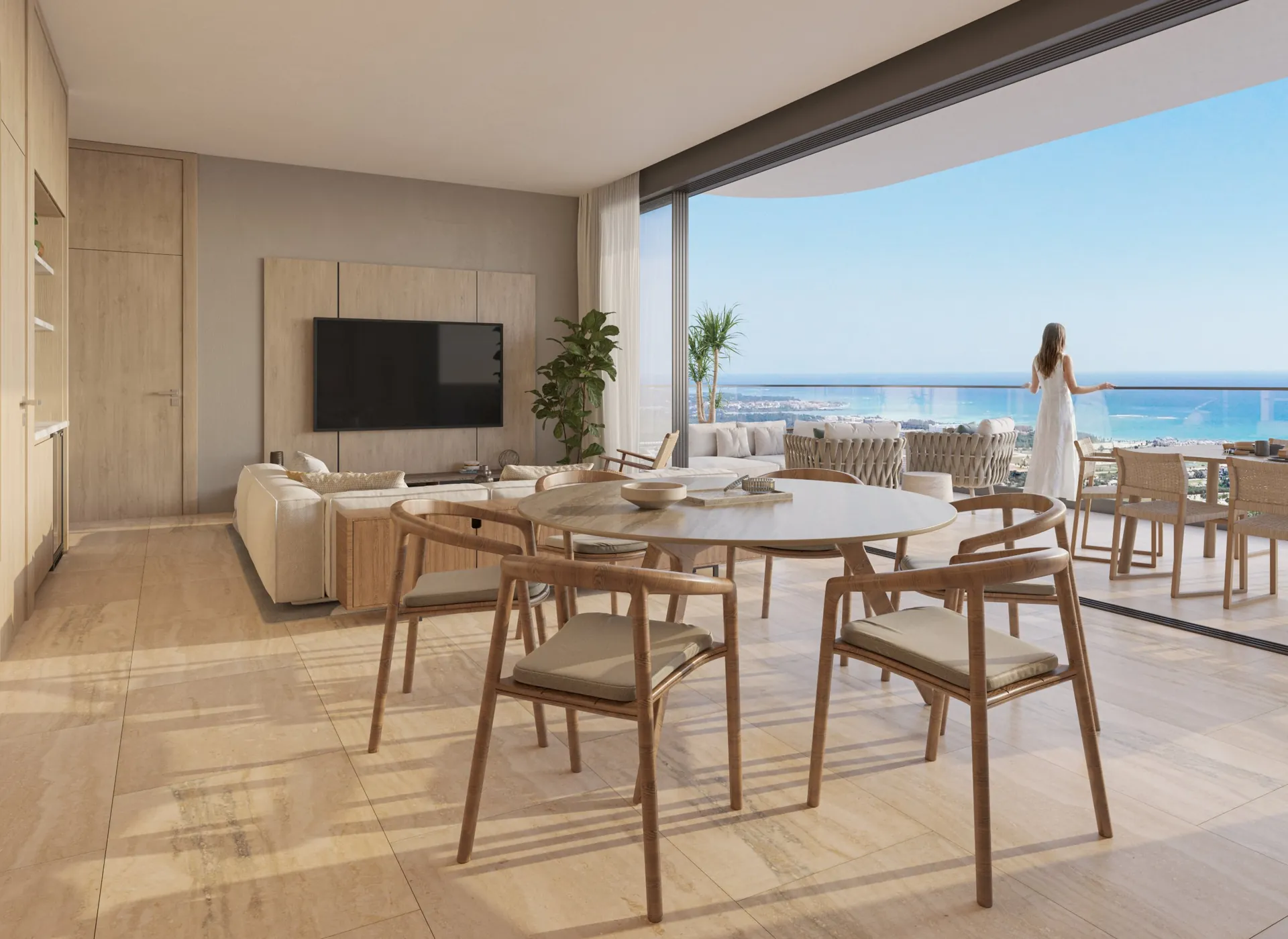 Bonita Beach Residences — Soggiorno e zona pranzo aperti su una terrazza vista mare