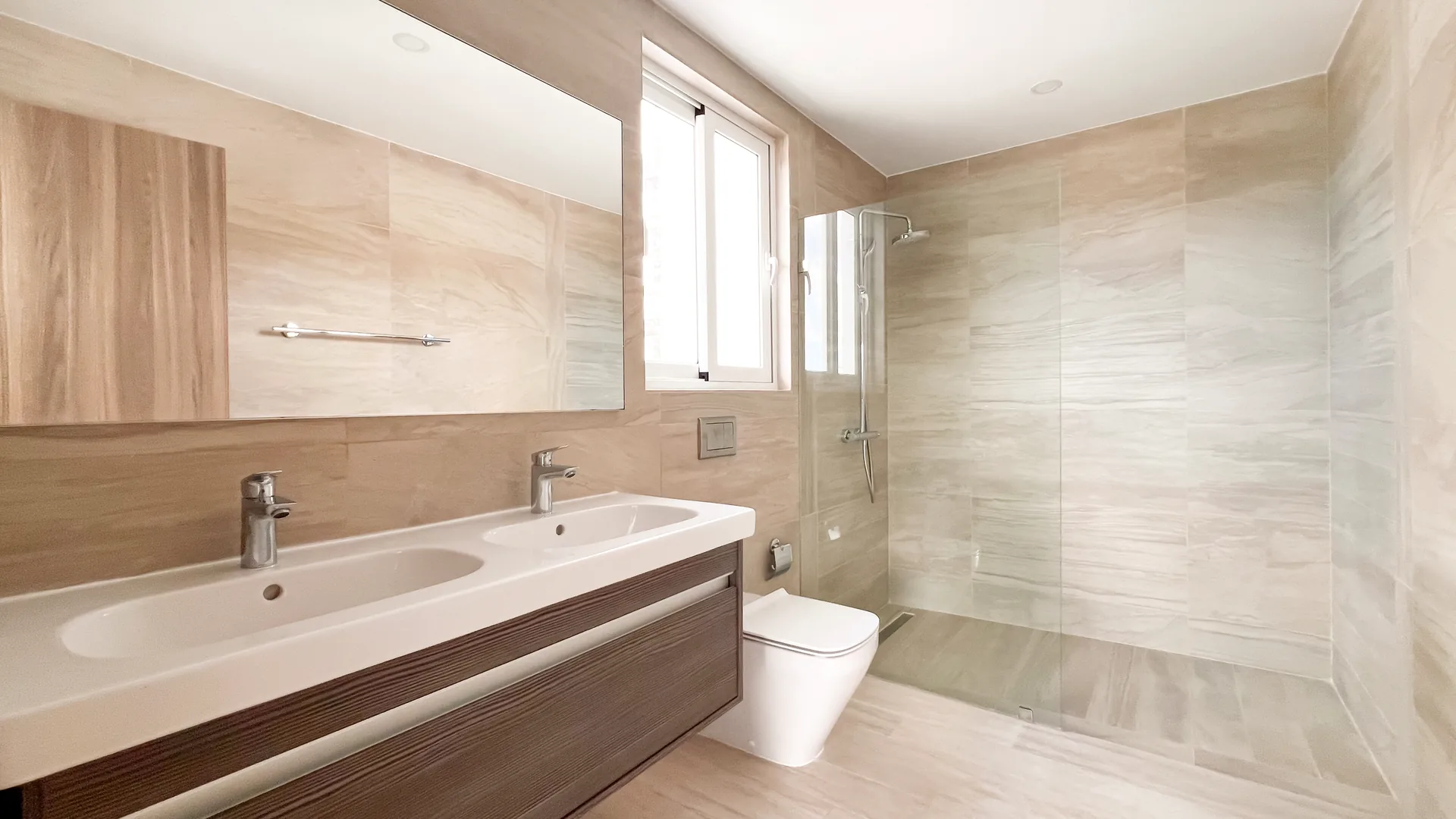 Cana Pearl · Rooftop Residence N-302 — Bathroom with double vanity and walk-in shower