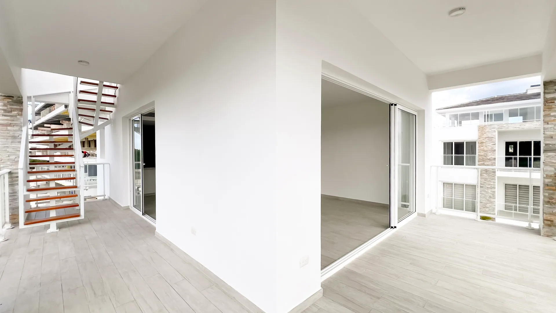 Cana Pearl · Rooftop Residence N-302 — Private staircase up to the rooftop