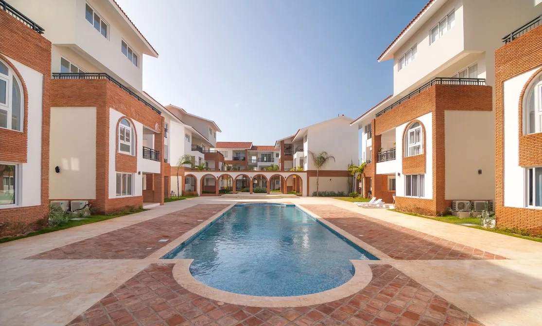 Coral Village · Apartment B-3-B — Pool and residential buildings