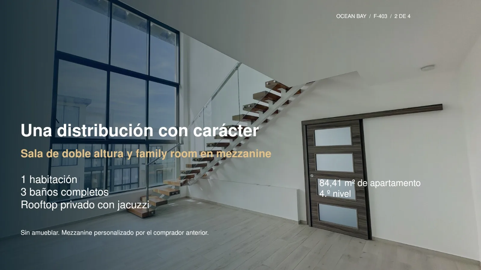 Ocean Bay · Loft F-403 with Rooftop — F-403 — double-height living room and mezzanine staircase (actual unit)