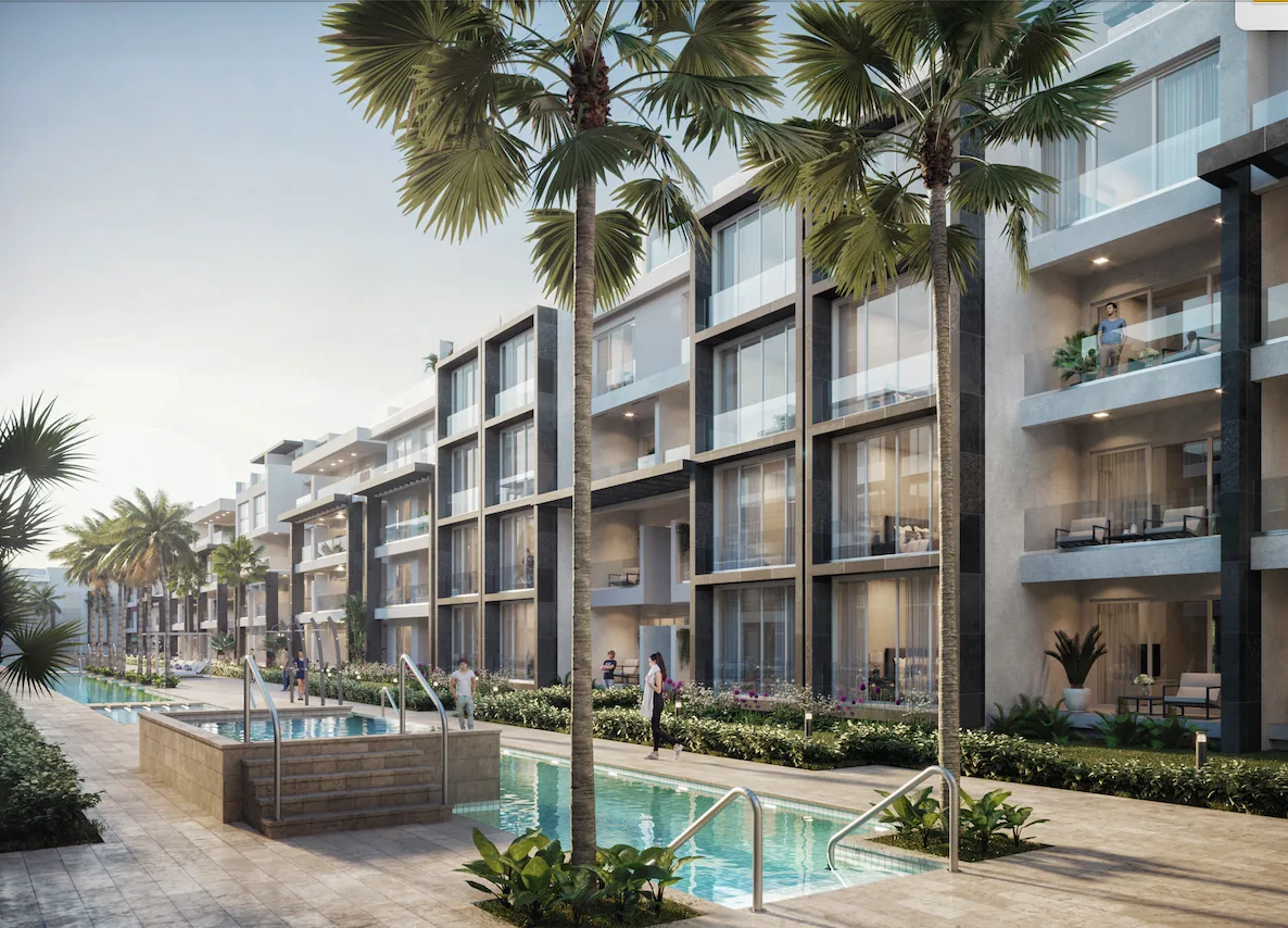 Ocean Bay · Loft F-403 with Rooftop — Pool walk with palm trees between the buildings