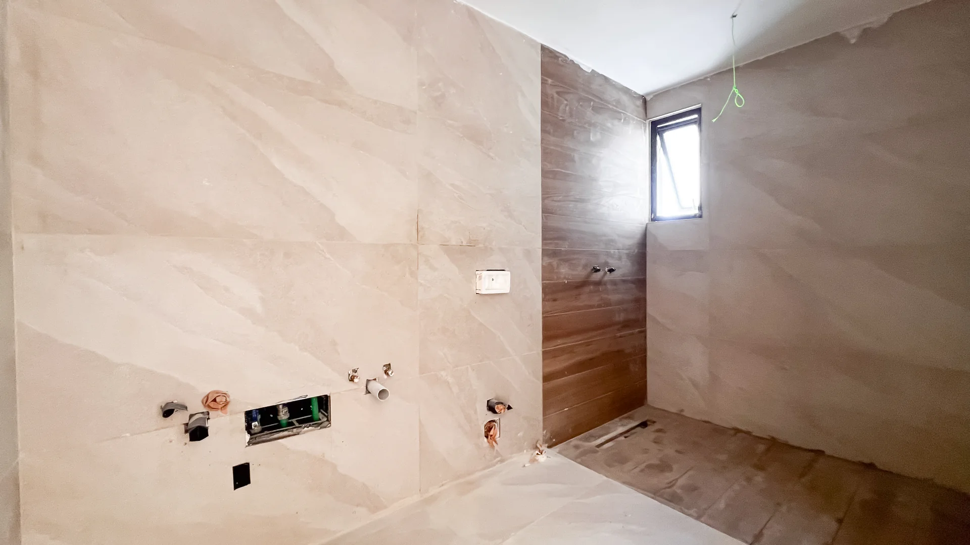 Oceana by Noval — Construction progress: bathroom tiling